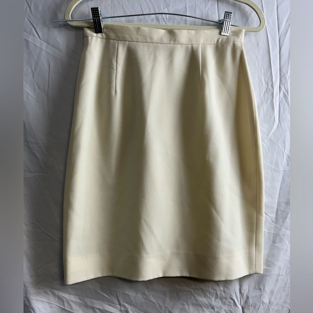 Cream vintage white midi skirt
Waist measures 28”